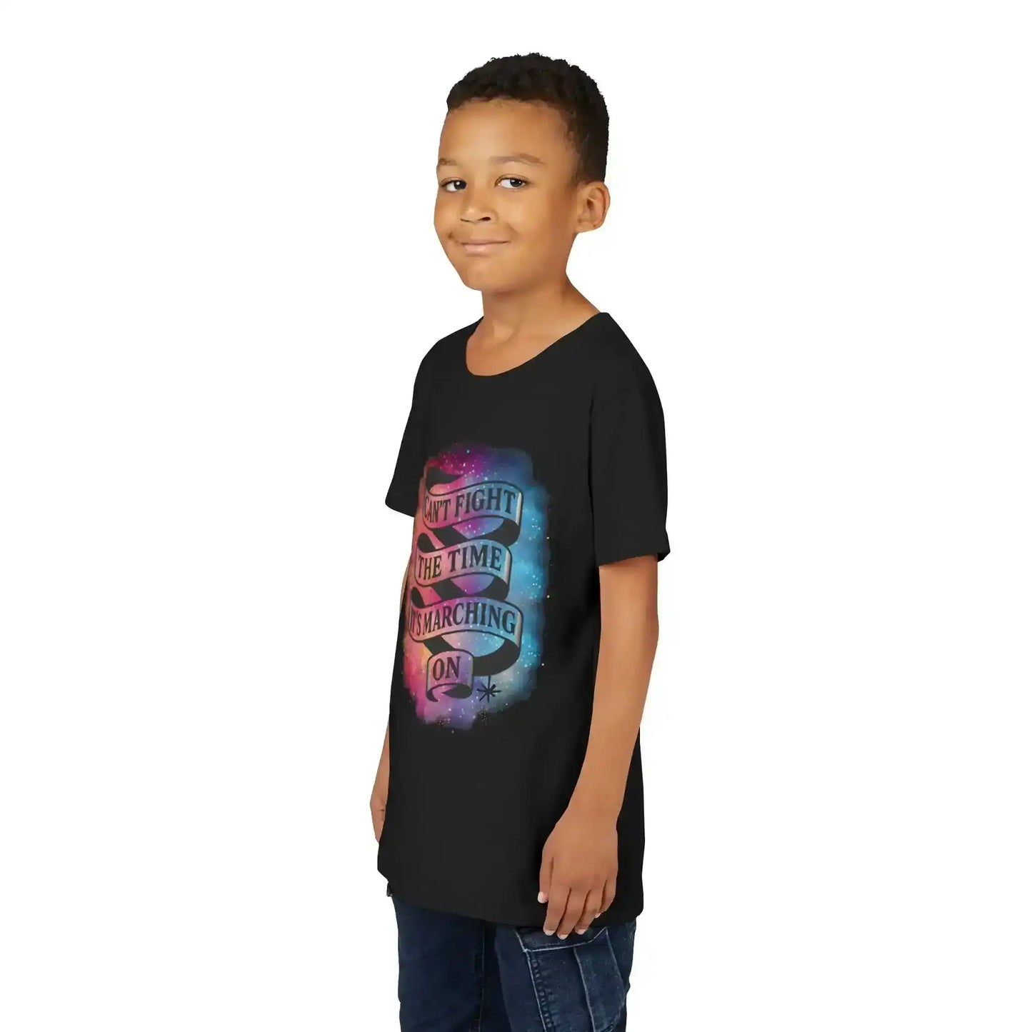 Smiling child wearing a black Cady Creations graphic tee with colorful text design