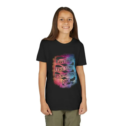 Smiling kid in black graphic tee with colorful 'Can't Fight The Time, It's Marching On' design