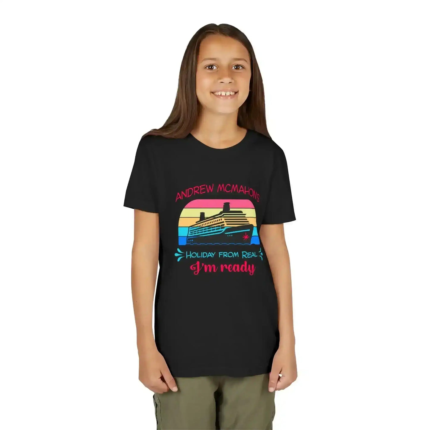 Smiling youth wearing Cady Creations graphic tee with cruise ship and retro colors.
