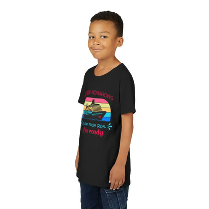 Smiling boy wearing a black graphic tee with a colorful cruise ship design, Cady Creations style