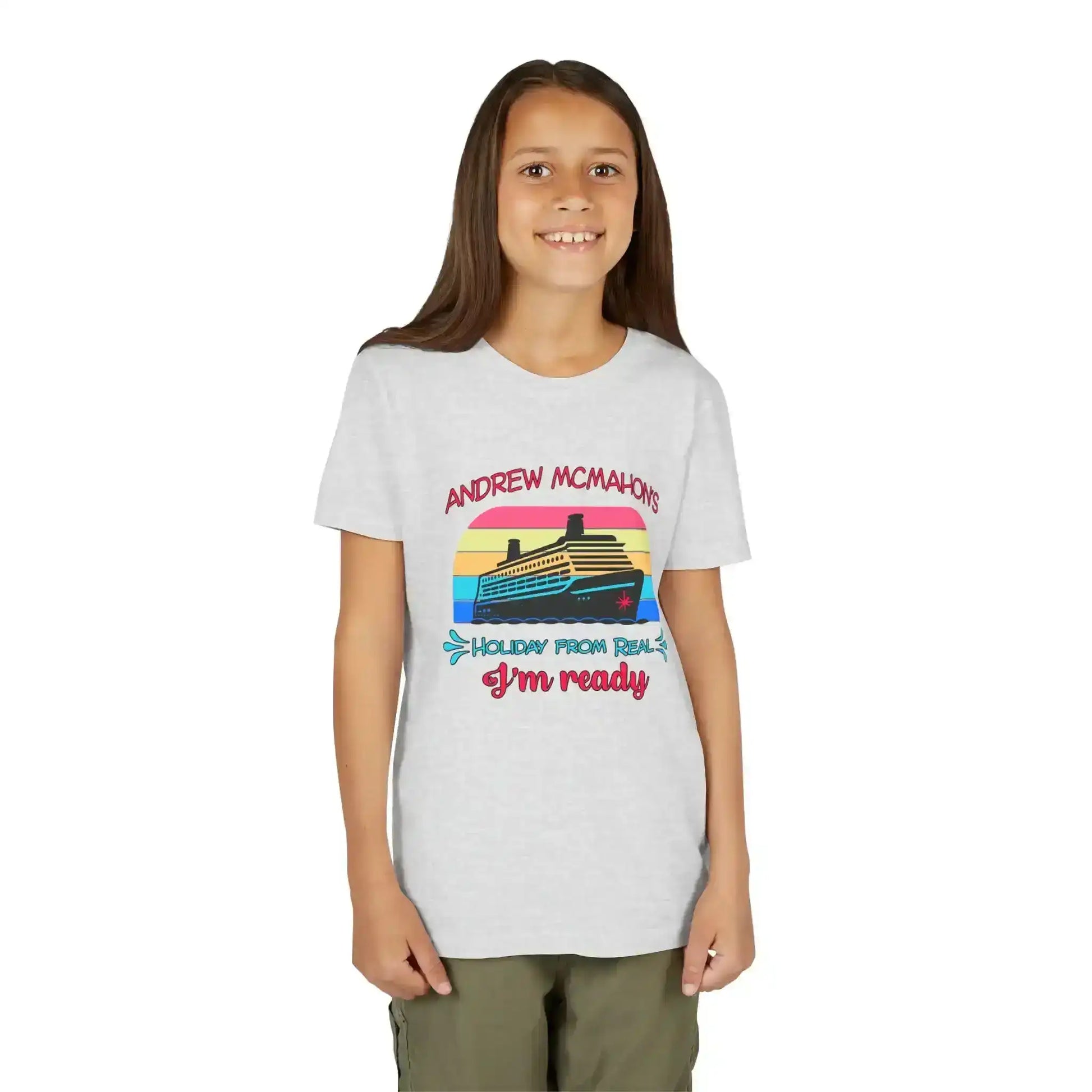 Smiling girl wearing a graphic tee with a cruise ship and retro sunset design from Cady Creations