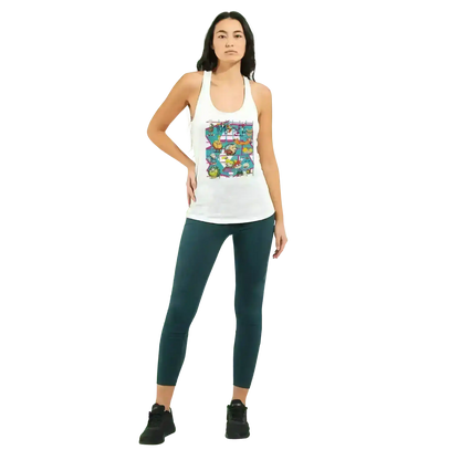 Woman wearing Cady Creations white racerback tank with colorful 90s retro cartoon grid design