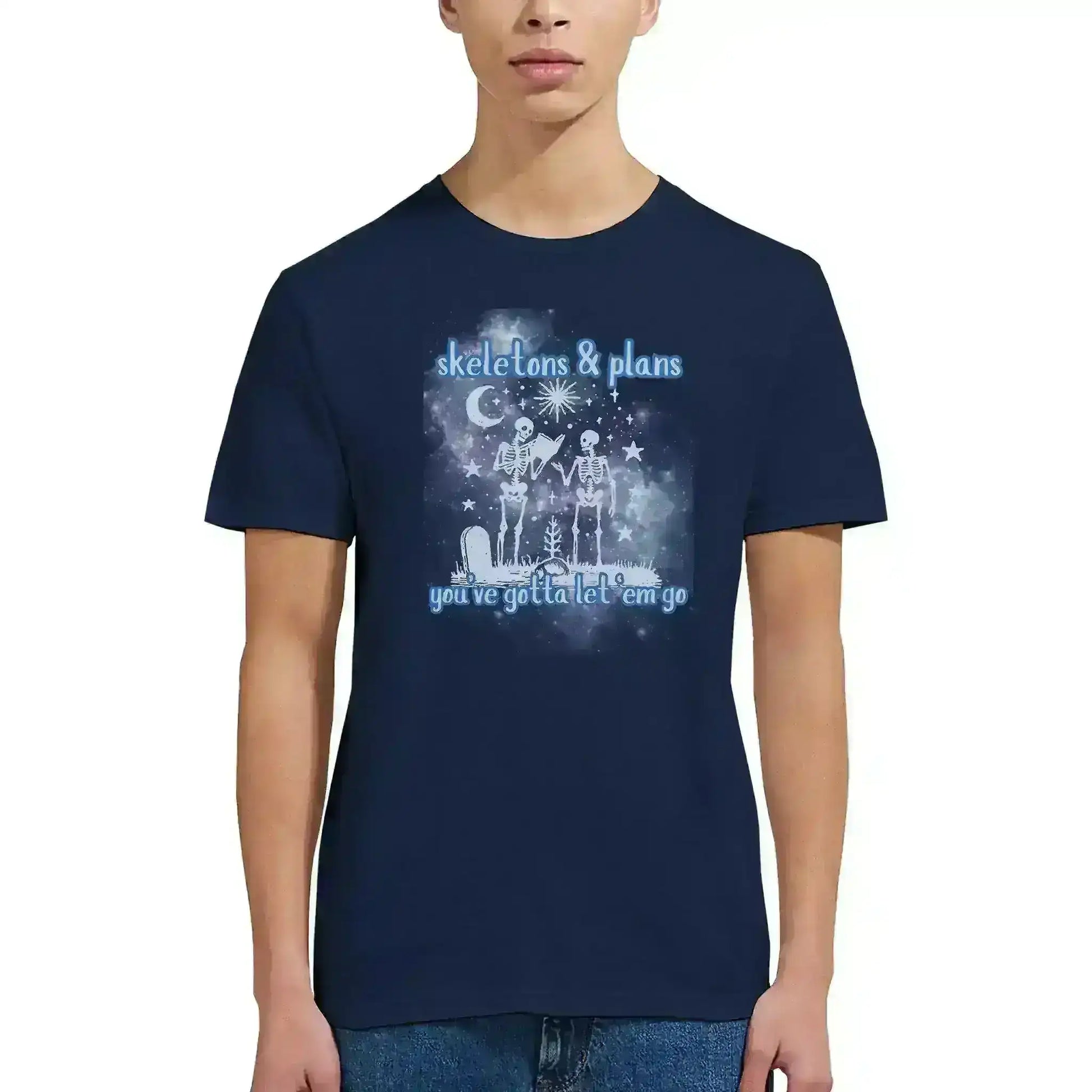 Navy unisex graphic tee with two skeletons, moon, stars, and text 'skeletons & plans you've gotta let 'em go' from Cady Creations.