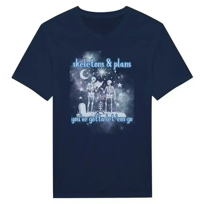 Navy graphic tee with skeletons, celestial designs, and text 'skeletons & plans you’ve gotta let ‘em go'