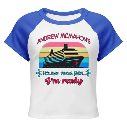 Women's white and royal blue raglan baby tee with cruise ship graphic and text 'Andrew McMahon's Holiday from Real I'm ready' from Cady Creations.
