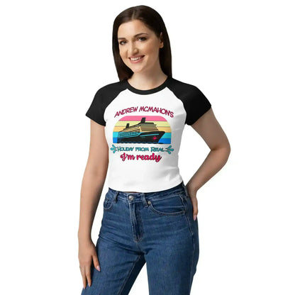 Woman wearing white and black raglan baby tee with colorful cruise ship graphic and Andrew McMahon text