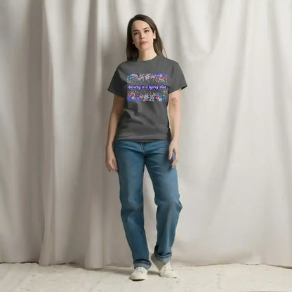 Woman wearing a dark heather graphic tee with bold text and floral pattern by Cady Creations