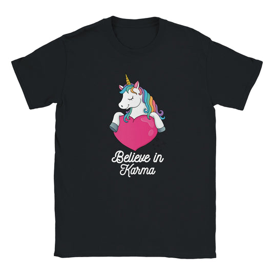 Believe in Karma graphic tee with unicorn design on black fabric.