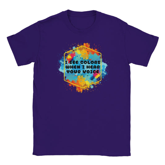 Synesthesia graphic tee with vibrant colors and phrase "I See Colors When I Hear Your Voice".