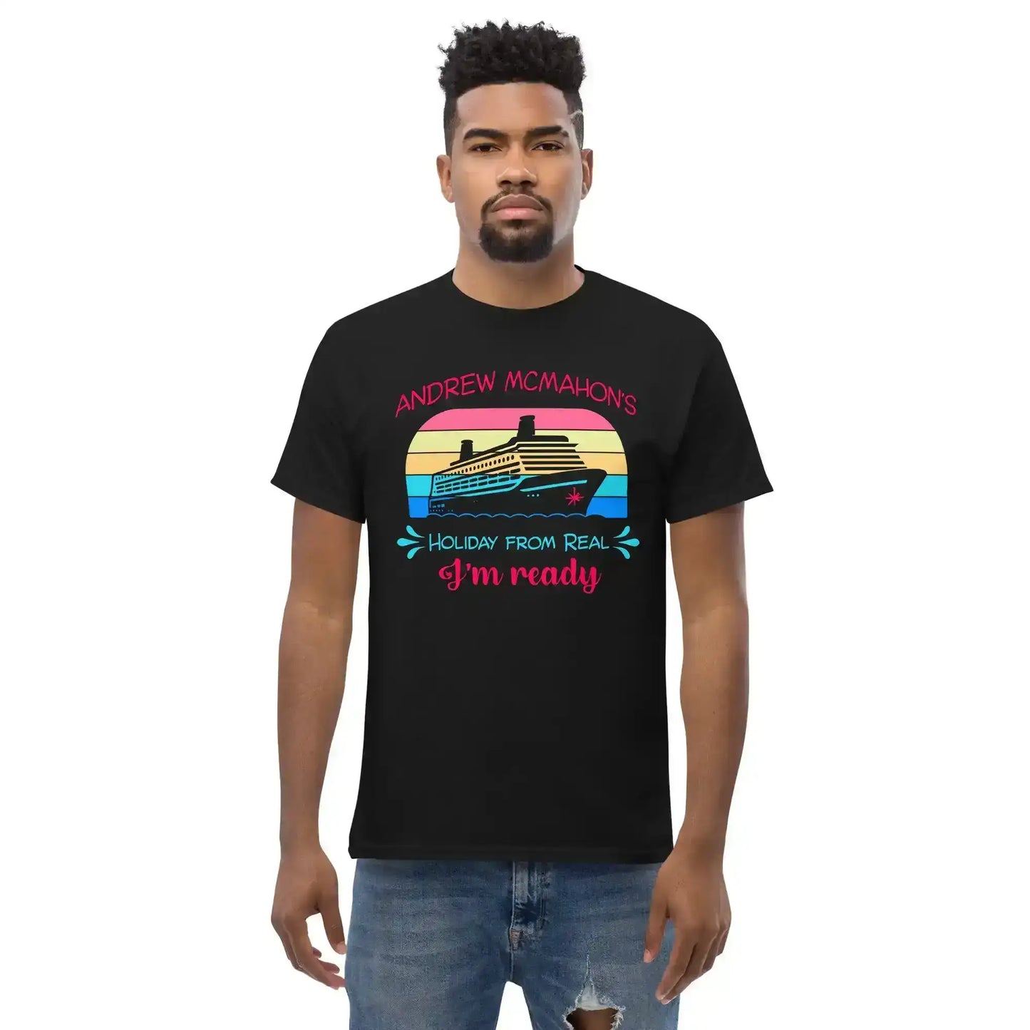 Man wears black graphic tee with cruise ship, colorful sunset, and 'Holiday from Real I'm ready' text.
