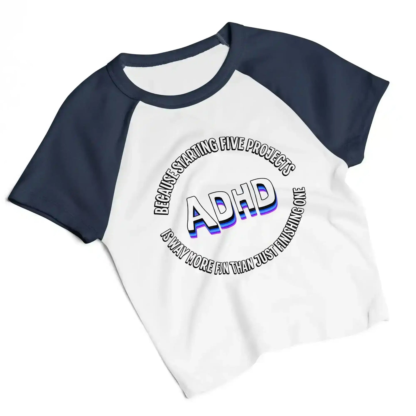 Women's white and navy raglan baby tee with 'ADHD' graphic text from Cady Creations.
