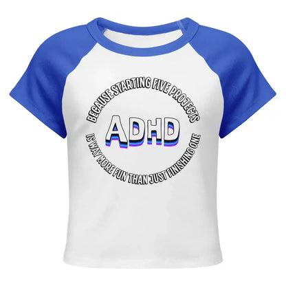 White and royal blue women's raglan baby tee with ADHD graphic text from Cady Creations.